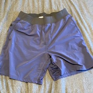Fabletics Lined 7” Franchise Short L Navy Blue